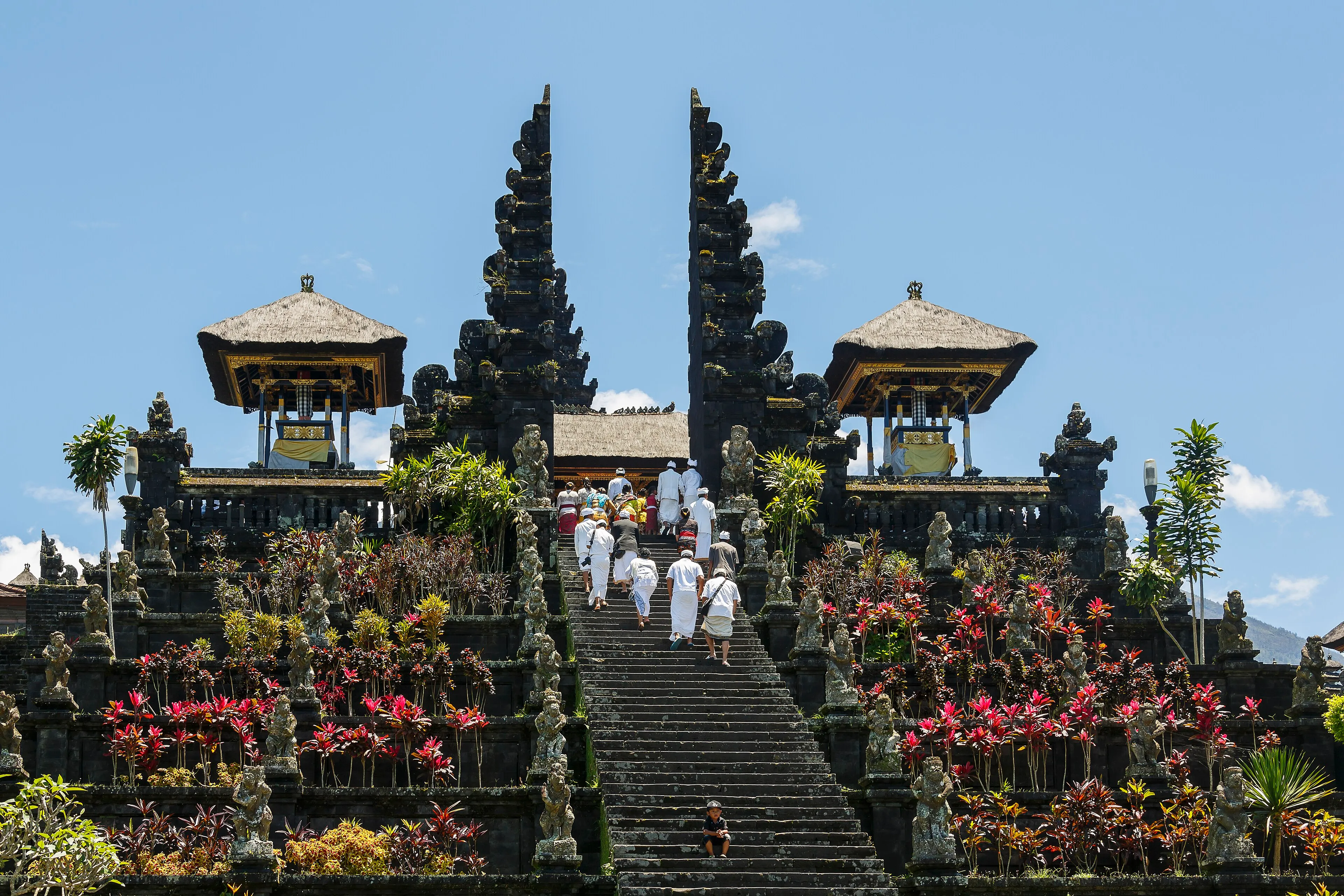 A montage of Bali rice terraces, Thailand temples and Vietnam lanterns